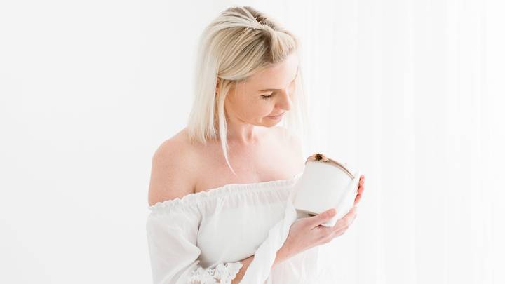 Photographer Mocks Panic Buyers With 'Newborn' Toilet Roll Shoot