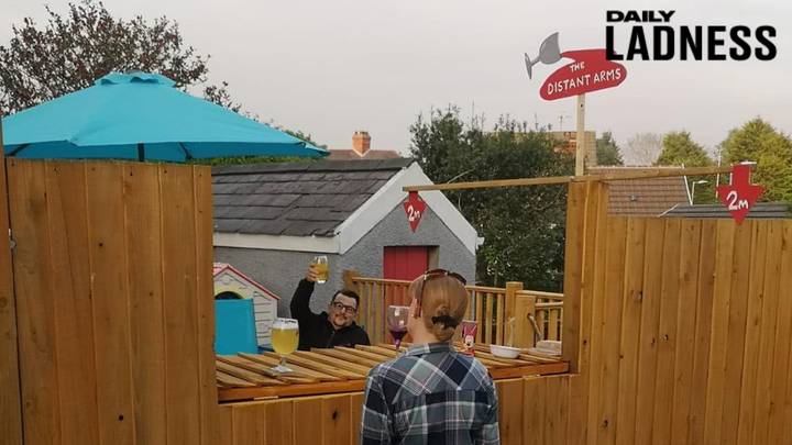 Neighbours Create Social-Distance-Friendly Pub In Garden So They Can Drink Together